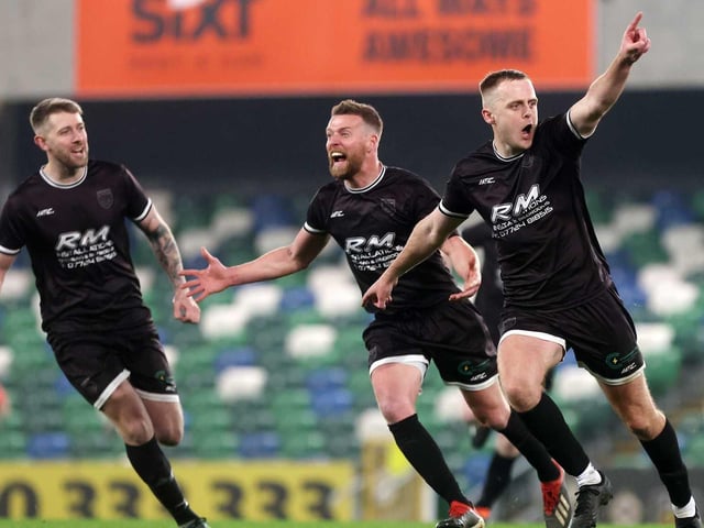 Ardmore's Oran Armstrong wheels away to celebrate his sublime free-kick during Friday's fonaCAB Craig Stanfield Irish Junior Cup final at Windsor Park. (Photo: IFA)