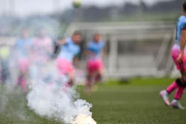 A general view of a flare after being thrown onto the pitch during the SSE Airtricity Men's Premier Division match between Derry City and Bohemians at The Ryan McBride Brandywell Stadium in Derry. Photo by Ramsey Cardy/Sportsfile