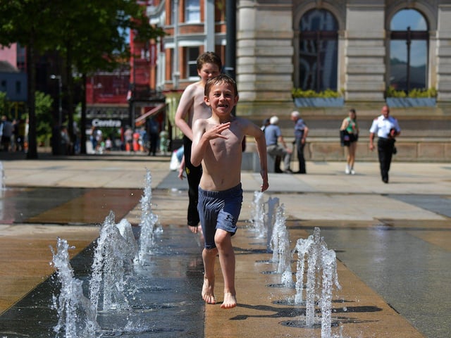 As ever the water fountains are popular in the sunshine. Photo: George Sweeney. DER2322GS - 84
