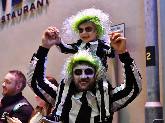Spectators pictured at the Halloween parade.  Photo: George Sweeney