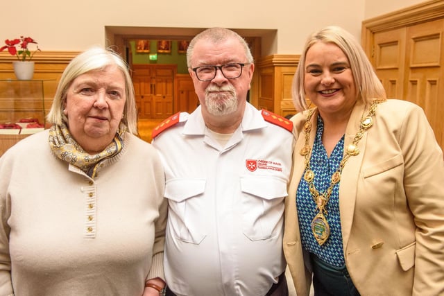 The Mayor Councillor Sandra Duffy welcomed members of the Order of Malta to the Guildhall where she presented the organisation with commemorative crystal in recognition of their contribution across the Derry City and Strabane District Council area. Pictured are Felicity Mairs and Charlie Glenn. Picture Martin McKeown. 06.02.23:Mayor of Derry City and Strabane District Council’s reception for Knights of Malta in the Mayor’s Parlour, Guildhall on Monday 6th February.