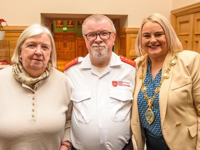 The Mayor Councillor Sandra Duffy welcomed members of the Order of Malta to the Guildhall where she presented the organisation with commemorative crystal in recognition of their contribution across the Derry City and Strabane District Council area. Pictured are Felicity Mairs and Charlie Glenn. Picture Martin McKeown. 06.02.23:Mayor of Derry City and Strabane District Council’s reception for Knights of Malta in the Mayor’s Parlour, Guildhall on Monday 6th February.