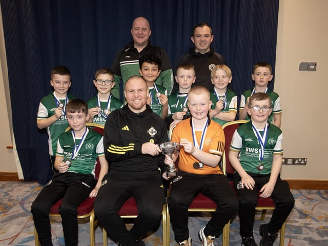 Ronan O'Donnell, Irish Football Association, special guest at the D&D Youth FA Annual Awards at the City Hotel on Friday night presents Foyle Harps FC U9s with the Summer Plate. Included are coaches Stevie McCormick and Gavin Canning.