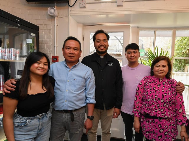 Proprietors Joseph and Ralyn Petingco and their children Hannah and Jason Paul pictured with Fr Milo  at the opening of Derry’s first Filipino restaurant, called Bahay Kusina, in the Craft Village, on Saturday afternoon. Photo: George Sweeney