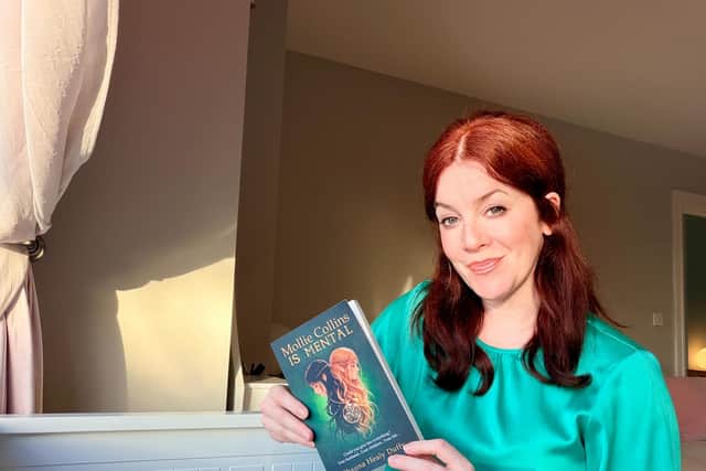 Author Shauna Healy Duffy with her debut book 'Mollie Collins Is Mental'.