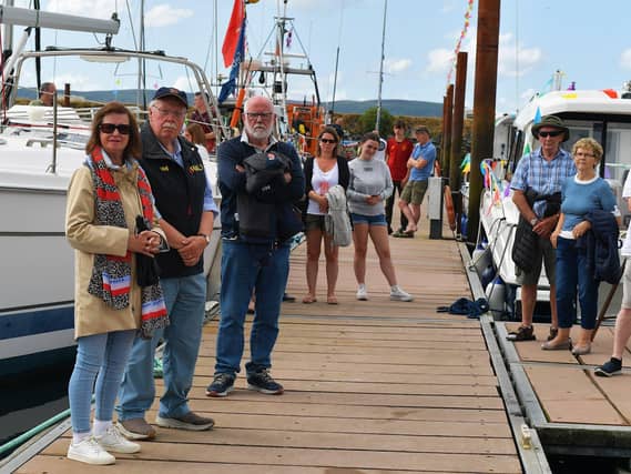 People attend the blessing of the boats at the Fahan Marina on Sunday afternoon. Photo: George Sweeney. DER2326GS - 10