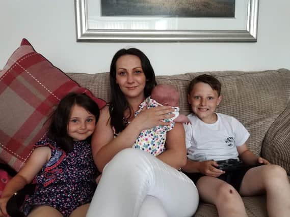 Jacqueline McCloskey with three of her four children