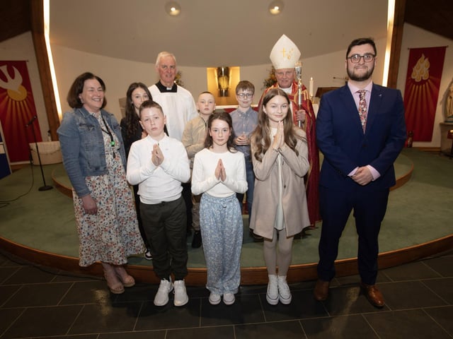 Pupils from Saint Columba's Primary School, Newbuildings, who received the Sacrament of Confirmation from Bishop Donal McKeown at Sacred Heart Church, Waterside on Friday last. Included in photo are Fr. Michael Canny, Vicar General, Mrs. Callan, Principal and Mr. O'Neill, P7 teacher. (Photo: Jim McCafferty Photography)