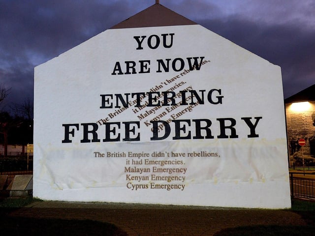 One of the projected images, on Free Derry Corner on Thursday evening, of the British colonial past from the ‘The Sun Never Set And The Blood Never Dries’ art project created by Art Everywhere. The event was part of Bloody Sunday 51 anniversary. Photo: George Sweeney. DER2305GS – 105