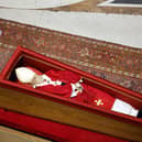 Irish-born US Cardinal Kevin Joseph Farrell holds incense next to Pope Francis' coffin at the Basilica at St Peter’s Square on April 23, 2025 in Vatican City, Vatican. On the third day since the death of Pope Francis was announced by the Vatican, his body is transferred from the Chapel of Santa Marta to the Basilica St Peter. He will lie in state in a simple wooden coffin until his funeral, which will be held on Saturday, 26th April 2025.  (Pool photo by Mario Tama/Getty Images)