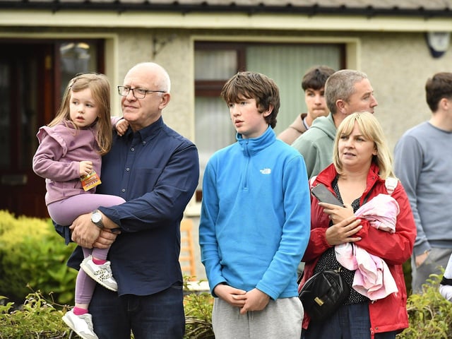 Spectators at the Muff Feile opening parade makes on Friday evening. Photo: George Sweeney