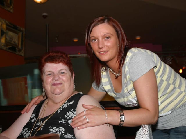 AnnMarie Doherty with her Auntie Anna enjoying the party in Flaming Jacks. 2924/dd : Parties and celebrations across Derry in May 2006.