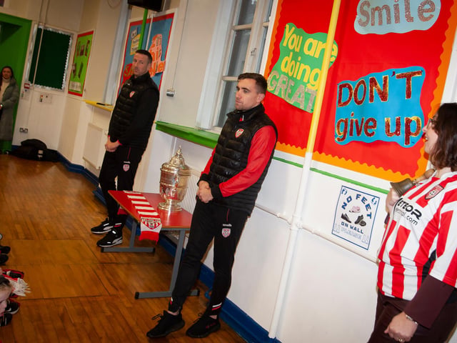 Derry City midfielder Joe Thomson is poised to take some difficult questions from the floor during his visit to St Eugene's PS.