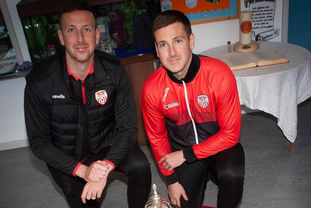 Former Steelstown PS pupils, Shane and Patrick McEleney, bring the FAI Cup to the school this week. (Photo: Jim McCafferty)