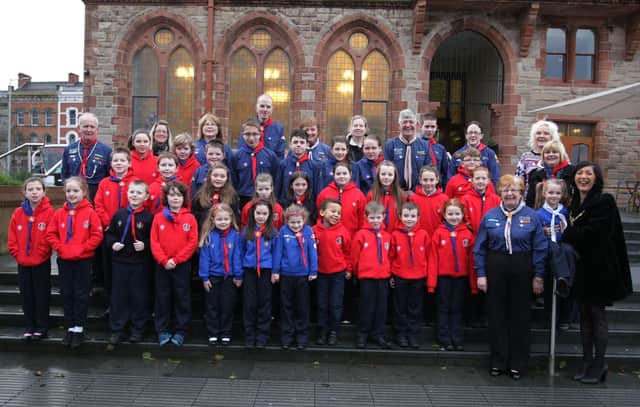2014: The Mayor of Derry, Councillor Brenda Stevenson pictured Beavers, Cubs and Scouts from St. Eugene's at the Guildhall. Youngest member Aoife Boyle is pictured with the Mayor. Included is Councillor Angela Dobbins, a former Scouts leader in the city. DER5014MC078