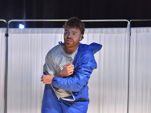 John, who has died by suicide, appears in the mortuary in a liminal space between life and death in Jonathan Burgess’s play Forever and Ever at New Gate Arts and Culture Centre. Photo: George Sweeney
