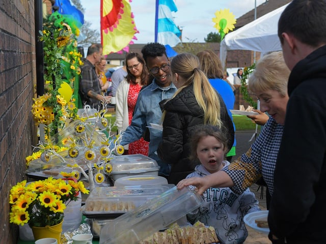 Enjoying the sunshine a food at the launch of the District of Hope at Farland Way, Hazelbank, on Tuesday afternoon last. Photo: George Sweeney