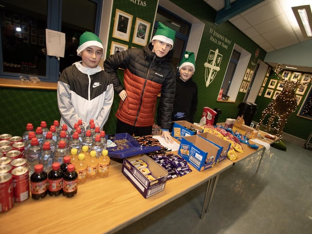 On Tuck Shop duty at St. Joseph's Boys School Rickety Wheel were John Kivlehan, Darragh Rogan and Ryan Coyle.