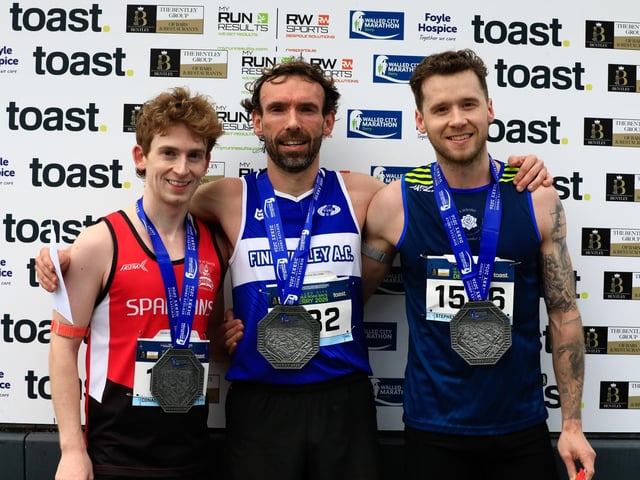 John Joe Doherty (Finn Valley AC), winner, with Conal McGinley (City of Derry Spartans AC), 2nd place and Stephen Pickering (Termoneeny Running Club), 3rd place in the Bentley Group Walled City 10 Mile race, Ebrington Square. (Photo - Tom Heaney, nwpresspics)