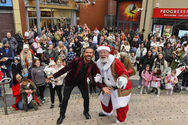 Mickey Doherty and Santa at the Richmond Shopping Centre on Sunday afternoon. Photo: George Sweeney