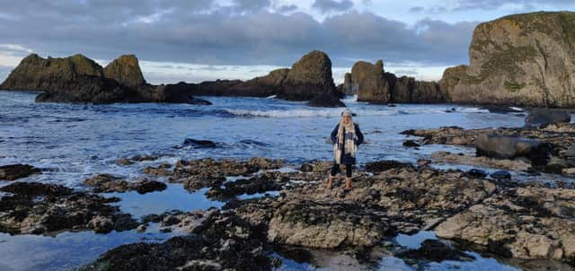 Deborah Wilson enjoying some of the north coast's dramatic coastline at Ballintoy.