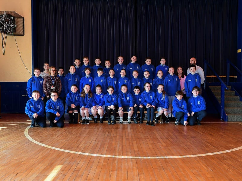 Mr McCrossan pictured with his P7 class and support staff at Nazareth House Primary School.