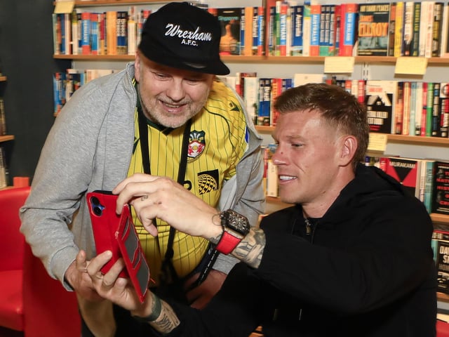 Professional footballer James McClean having a “selfie” at the signing of his autobiography, “The Walls” in Waterstones, Foyleside, with Andrew Humphries. (Photo - Tom Heaney, nwpresspics)