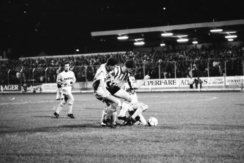 A battle for possession during the Candystripes' clash with Manchester City.