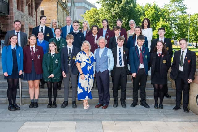 Studnets and staff pictured at  the launch of the International Cities of Peace led by the Mayor Councillor Sandra Duffy and Rev David Latimer. Picture Martin McKeown. 31.05.23