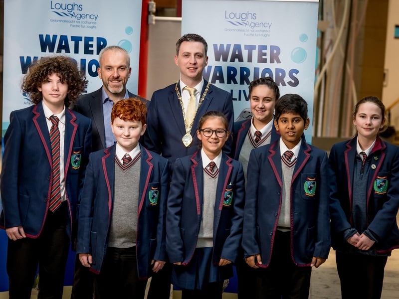 Students from Oakgrove Integrated College alongside JP O’Doherty, Loughs Agency Director of Corporate Services, and Deputy Mayor of Derry and Strabane District Council, Councillor Jason Barr