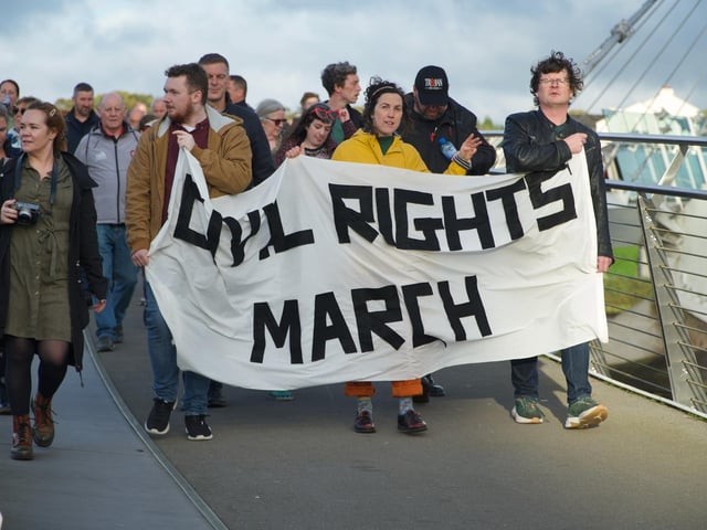 People leading the memorial walk.