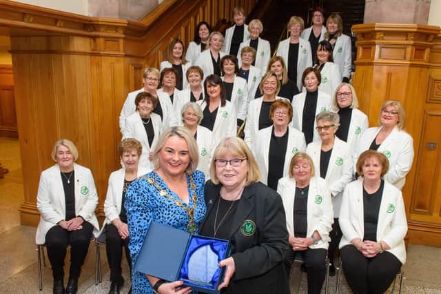 The Mayor Councillor Sandra Duffy pictured with Musicial Director, Sheila Carlin as she welcomed the members of Colmcille Ladies Choir to a reception in the Guildhall as they mark their 50th Anniversary. Picture Martin McKeown. 20.01.23:.