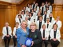 The Mayor Councillor Sandra Duffy pictured with Musicial Director, Sheila Carlin as she welcomed the members of Colmcille Ladies Choir to a reception in the Guildhall as they mark their 50th Anniversary. Picture Martin McKeown. 20.01.23:.