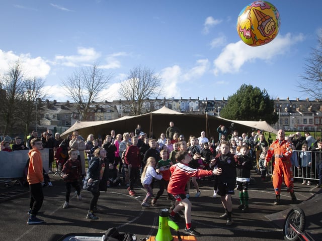 Attempting a World Record at keeping the beach ball in the air with Jitterburg Jackson on Saturday.