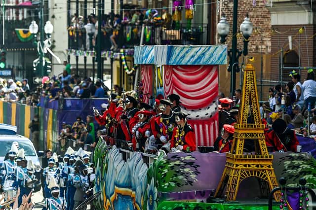 People participate in the 2023 Krewe of Okeanos parade during Mardi Gras in New Orleans, Louisiana, on February 19, 2022. (Photo by CHANDAN KHANNA / AFP) (Photo by CHANDAN KHANNA/AFP via Getty Images)