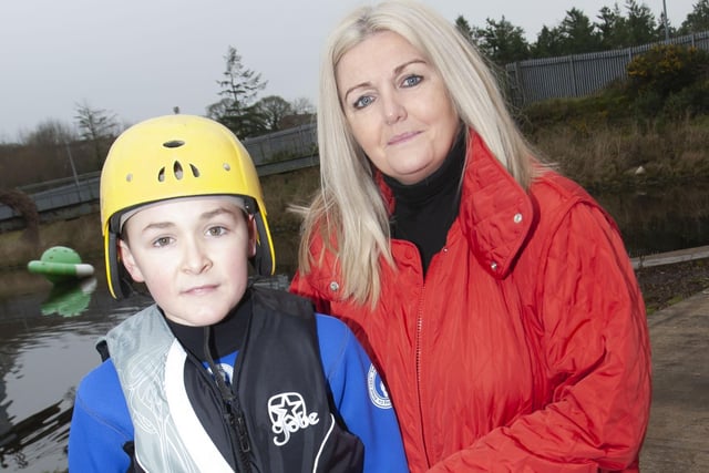 Year 8 student Michael Coyle pictured with St. Joseph’s Boys School Principal Ciara Deane before his pier jump on Saturday.