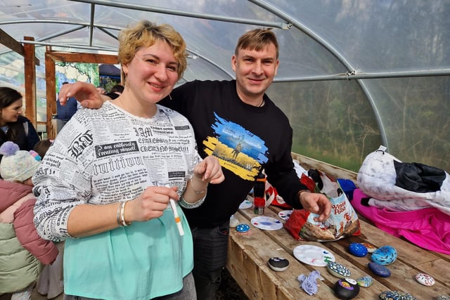 Artist Hanna Pidkaliuk with Viktor Dovbnicv at the rock art tent along the Easter Trail.