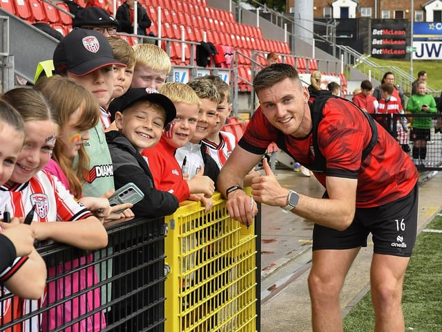 Hayden Cann picture with fans at the Derry City open training session on Monday morning in  Brandywell Stadium. The event was organised at part of the Gasyard Feile.  Photo: George Sweeney / Derry Journal