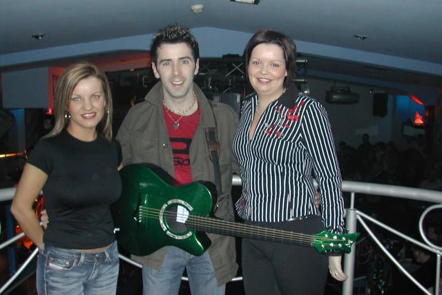Marian and Una pictured with Mickey Joe Harte.