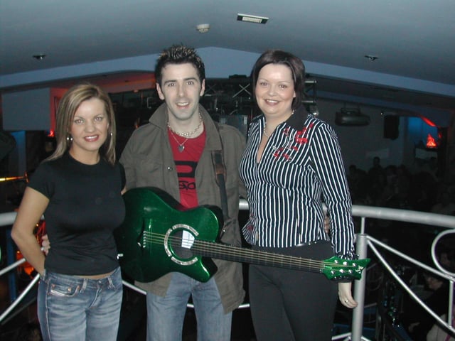 Marian and Una pictured with Mickey Joe Harte.