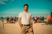 Joel Dommett and the cast of Survivor