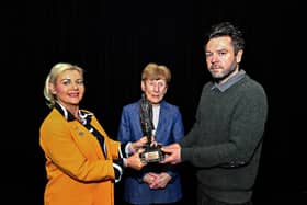 Mrs Genevieve Sweeney (left), Trophy Secretary Feis Dhoire Cholmcille, Mrs Joan Conaghan, sister of the late Fr Kevin Mullan and sculptor of the Fr Mullan Perpetual Memorial Award, Rory Harron pictured at the launch of the Feis  Dhoire newest award. Photo: George Sweeney