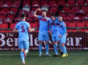 Institute’s Dylan King (left) and Calvin McCallion celebrate Jamie McCormick’s (middle) goal against Annagh United. Picture by George Sweeney. DER2308GS – 158