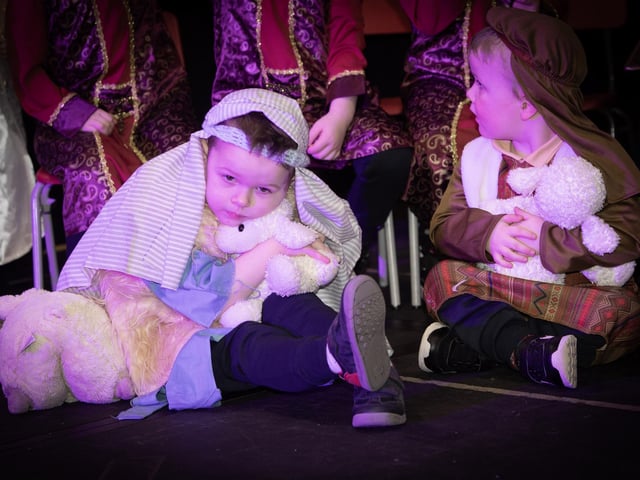 STEELSTOWN NATIVITY. . . .Nursery shepherds have a well-earned rest with their lambs during the Nativity Play at Steelstown Primary School last week. (Photos: Jim McCafferty Photography)