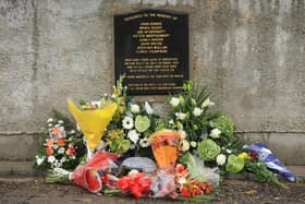 Flowers left at the memorial in Greysteel in Co Derry on the 20th Anniversary of the shooting 10 years ago. Pic Colm Lenaghan/Pacemaker