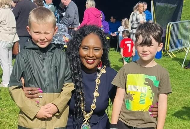 Mayor Lilian Seenoi-Barr with some of the children at the event.