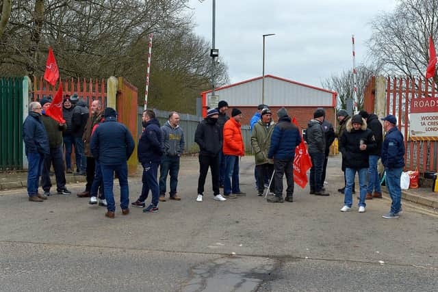 Roads Services workers gather to picket the Depart for Infrastructure Woodburn Roads depot on Crescent Road on Wednesday morning. Photo: George Sweeney. DER2310GS – 18