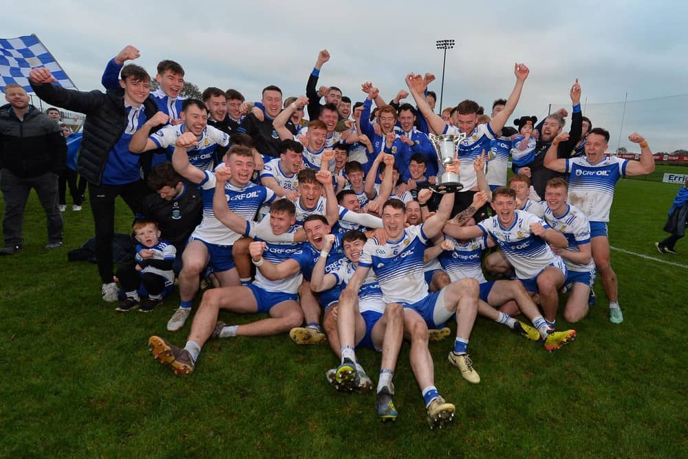 Ballinderry Shamrocks celebrate their Derry Intermediate Championship title after defeating Faughanvale in Owenbeg on Saturday. (Photo: George Sweeney)