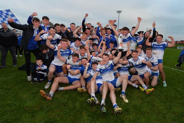 Ballinderry Shamrocks celebrate their Derry Intermediate Championship title after defeating Faughanvale in Owenbeg on Saturday. (Photo: George Sweeney)