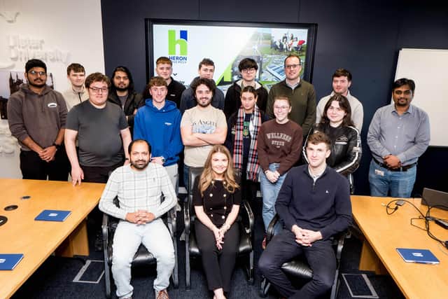 Members of the Heron Energy team pictured with staff and students from Ulster University’s Engineering programmes at the Derry (Magee) campus.